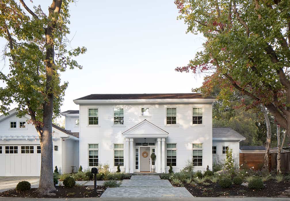 Colonial-style house including vinyl siding