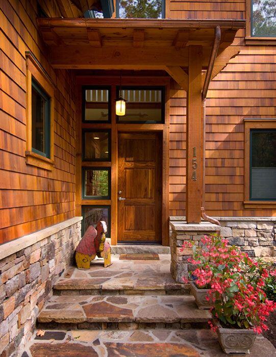 Natural wood siding with natural stone veneers