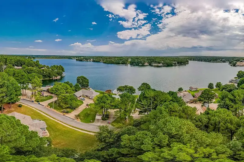 Lake Loch Lomond in Bella Vista, Arkansas surrounded by wooded Ozark hills