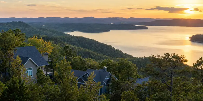 Sunset over Table Rock Lake near Branson, Missouri with ridge-top homes nestled in the Ozark hills